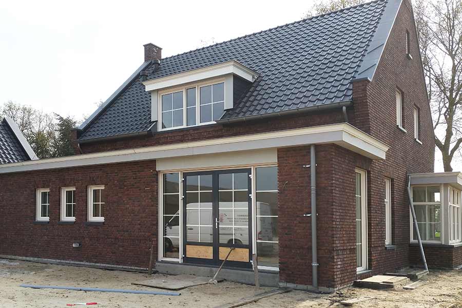 Zijaanzicht herbouw van een woning in Vinkel